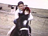 Deux enfants qui galopent sur poney