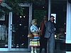 Ville; automobiles, magasins, jeunes couples, Willie Lamothe (vedette)