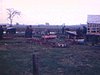 Encan, Samedi le 2 mai 1970 M. Gérard Hébert (affiche); automobiles stationnées le long de la route pour l'encan (animaux, bois de chauffage, etc.)