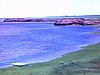 IÎe-du-Prince-Edouard; village côtier, cages à homards, motel, bateaux amarrés (Borden Ferry), départ du traversier et à bord