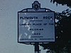 Ville de Plymouth «Landing Place of the Pilgrims, 1820»; personnages costumés, bateau et village d'époque - touristique