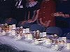 Saint-Pie; Carnaval: tables mises avant l'arrivée des invités; deux policiers ouvrent la marche devant le Bonhomme qui tient la couronne; le clergé suit avec un bonhomme carnaval épinglé à la soutane