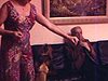 Notaire et sa famille; la femme nourrit les chiens en les faisant japper et faire le beau