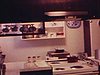 Chez le notaire: la cuisinette,  la chambre à coucher, le bureau