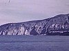 Iles du Sud de l'Italie; intérieur d'un bateau de touristes: s'approche d'une Île, plusieurs chaloupes de touristes, paysages des Îles