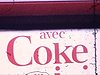 Pancarte «Avec Coke, y a d'la joie» (que d'ironie) image exceptionnelle de conflit de travail ouvrier