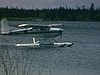 (sonore) pêche - visite d'un avion au campement