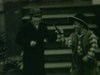Enfants qui jouent au cow-boy (très beaux plans) en 1939 - garçon pointe la caméra avec son fusil, il porte le costume cow-boy au complet - très beau plan