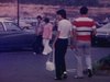 Niagara Falls, des gens dans un stationnement, automobiles anciennes, les gens se promènent dans la ville, horloge en fleurs, parlement d’Ottawa - 1973