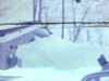 Tempête du siècle (historique) un autobus dans la neige, des gens font du ski dans la rue, motoneige, personnes déneigent la rue, enfants jouent dans la neige - célèbre