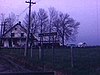 Sur une route de village, enseigne 